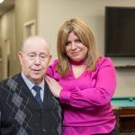 director of adult day care Rena Rafailova with the client