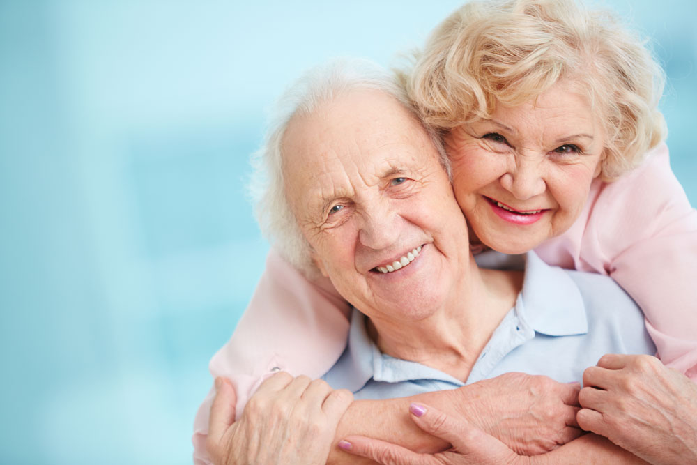 Elderly happy couple smiling who made right life choices to stop ageing