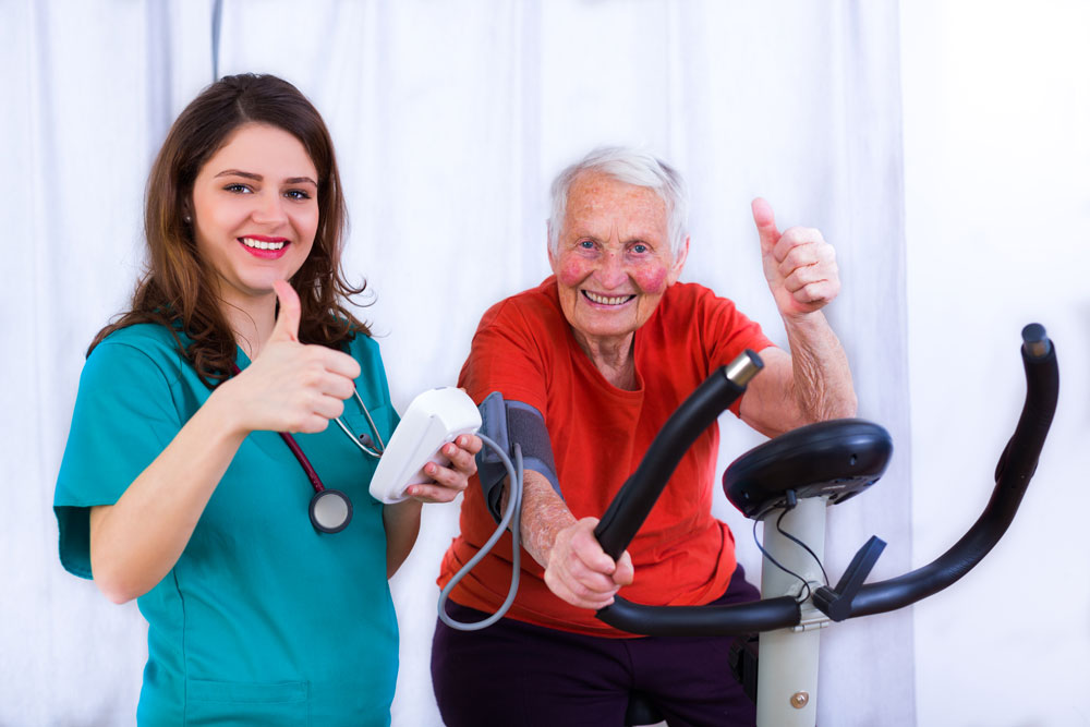 elderly woman getting physical therapy to avoid stroke