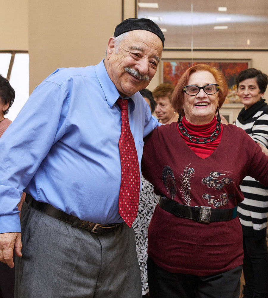 Senior couple participating in fun exercising activity to stay physically active