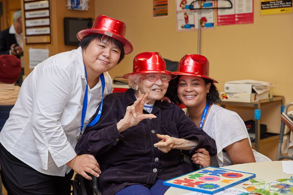 Senior women enjoying together to reduce symptoms of stress.